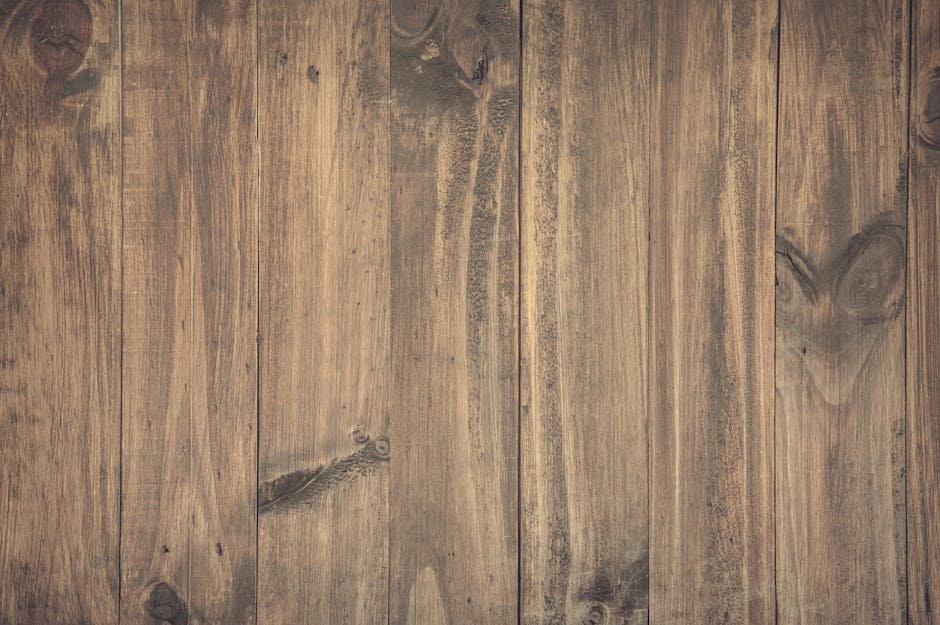 High-resolution image of rustic wooden planks with detailed grain texture, perfect for backgrounds.