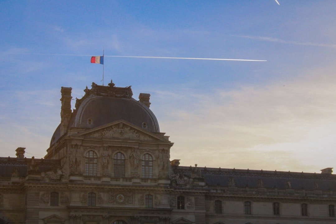 a large building with a flag on top of it