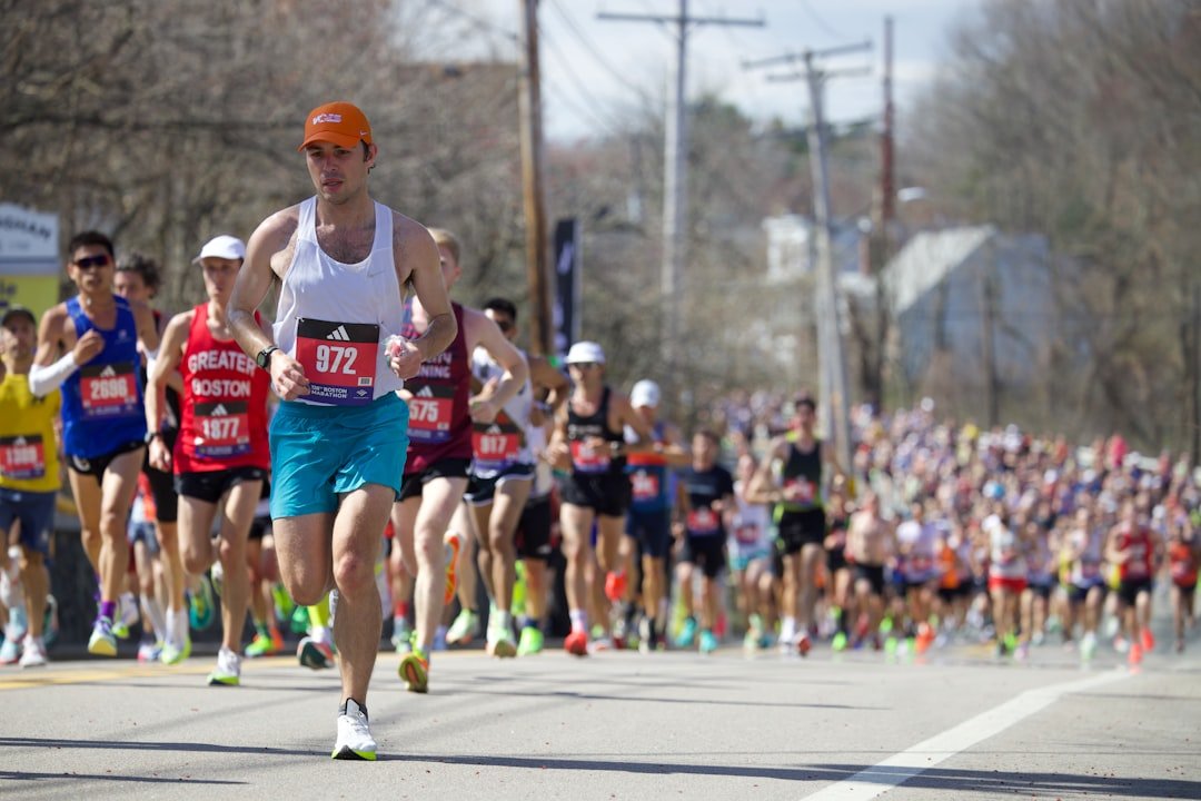 A large group of people running down a street