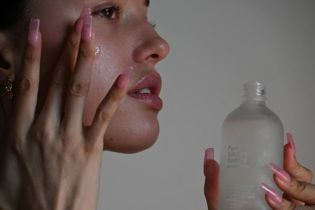 a person holding a bottle